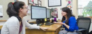 student meeting with her advisor