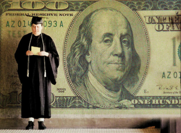graduate student holding money